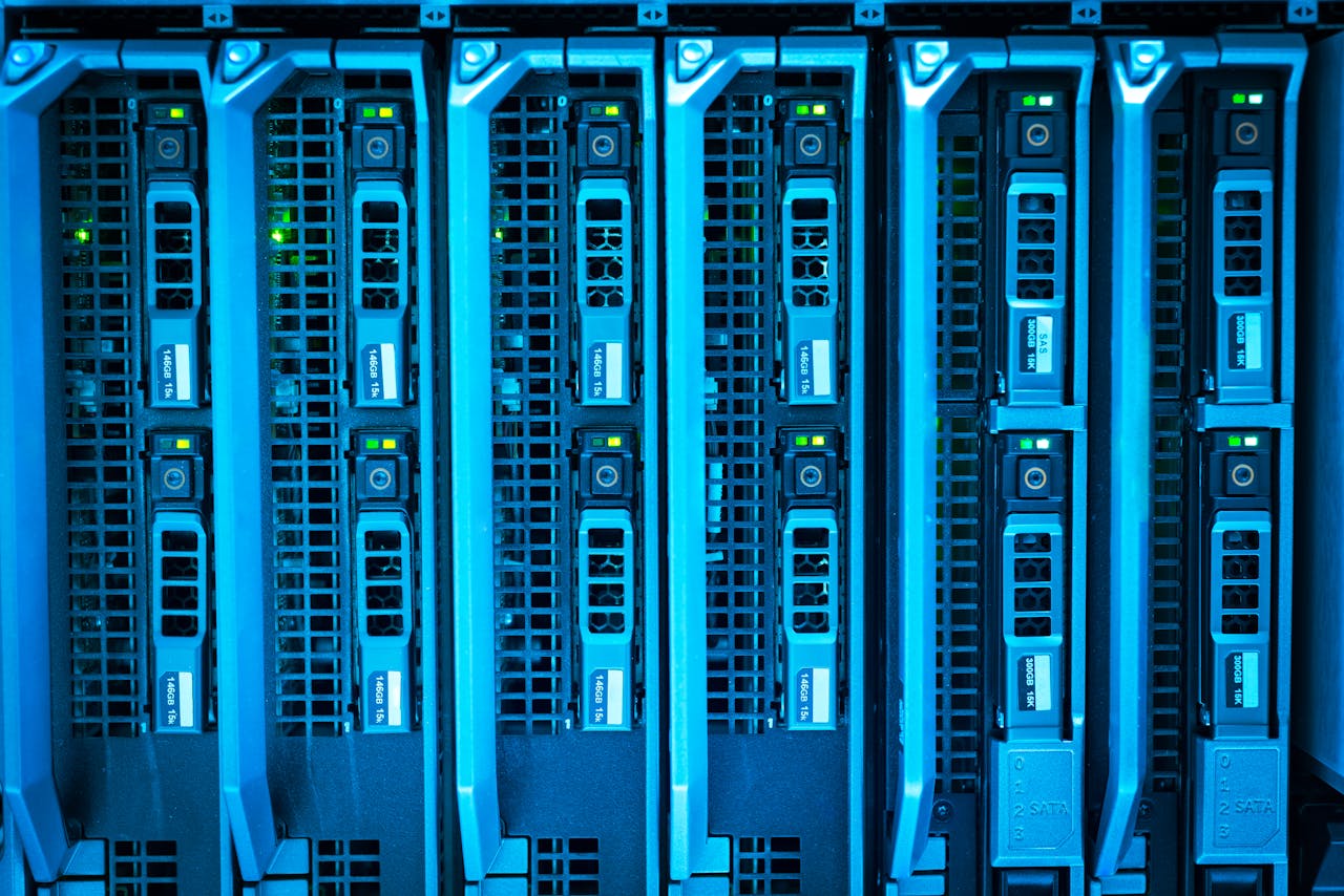 hero-img-01 Detailed image of illuminated server racks showcasing modern technology infrastructure.